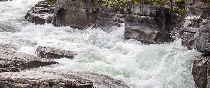 water churning on a rocky coastline