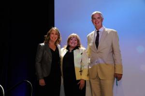 Longmont Public Safety Chief Mike Butler accepts the Individual of the Year award from Speaker Pro Tempore Jessie Danielson and Colorado Senator Beth Martinez Humenik