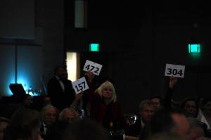 Guests bid on live auction items