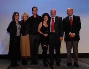 Representatives from Durango accept the Lifetime Achievement award on behalf of Therese Michels